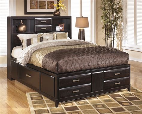 Kira King Storage Bed from Ashley (B473-66-69-99) | Coleman Furniture