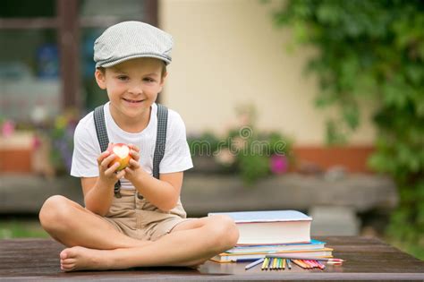 Boy, Writing His Homework from School, Drawing and Writing in Hi Stock Image - Image of ...