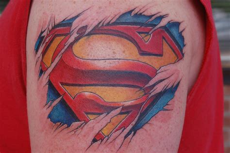 Colorful-Ripped-Skin-Superman-Logo-Tattoo-Design-For-Shoulder ...