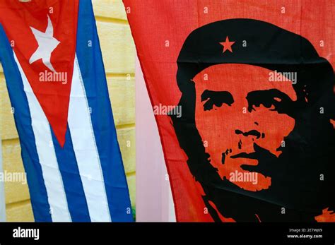 Cuban National Flag with banner of communist icon Che Guevara, Cuba Stock Photo - Alamy