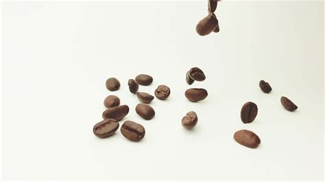 Slow motion of roasted coffee beans 8668462 Stock Video at Vecteezy