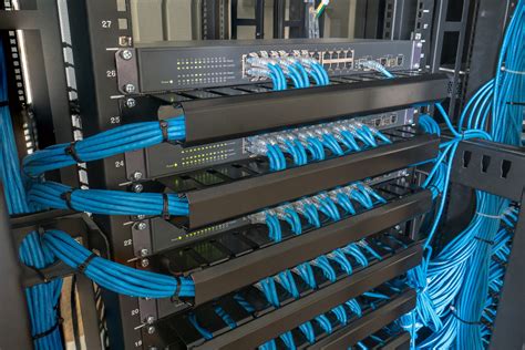 Network switch and ethernet cables in rack cabinet | RTC Business Solutions