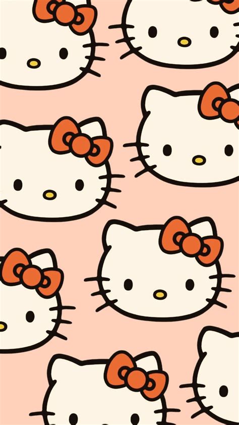 an image of hello kitty wallpaper in pink and white colors with orange bows on it