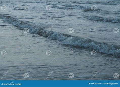 The Small Waves on the Beach Stock Photo - Image of surf, background: 156265558