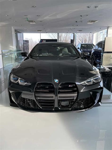 New photos of the 2021 BMW M4 in Sapphire Black Metallic