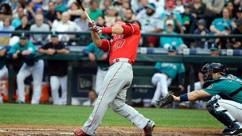 Mike Trout hitting one of his two HRs during the Los Angeles Angels' 7-3 win over the Seattle ...