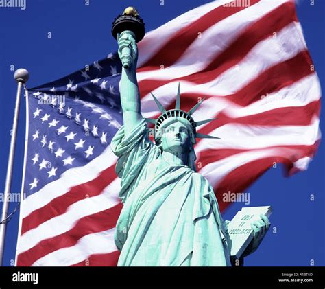 USA New York The Statue of Liberty and US Flag Stock Photo: 3327084 - Alamy