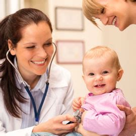 Pediatric Dermatology Jupiter - Doctor examine baby with stethoscope