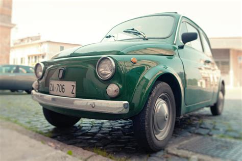 Vintage green FIAT 500 in Italy Photograph by Vlad Baciu - Pixels