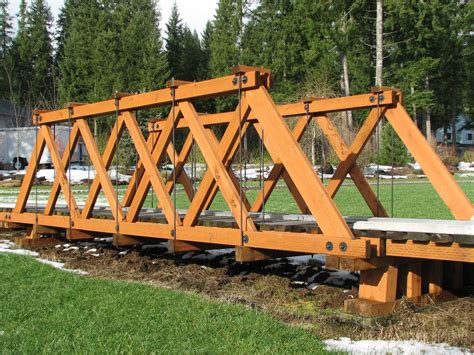 Building a Bridge | Garden bridge design, Backyard bridges, Framing construction