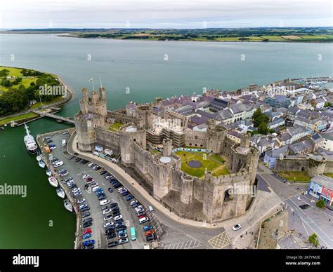 Aerial view of the ancient Caernarfon Castle in North Wales Stock Photo - Alamy