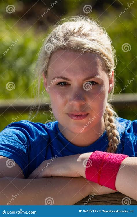 Fit Woman Leaning on Hurdles during Obstacle Course Training in the ...