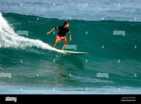 Hawaii, Oahu. Girl Surfing At Rocky Point Stock Photo - Alamy