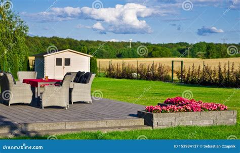 Elegant Home Terrace with Garden Furniture Stock Image - Image of contemporary, sunny: 153984137