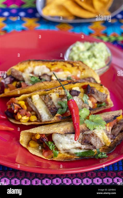 Grilled mexican tacos on a plate Stock Photo - Alamy