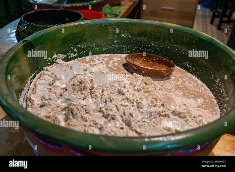 A frothy maize drink called tejate for sale in the Benito Juarez Market in Oaxaca, Mexico ...