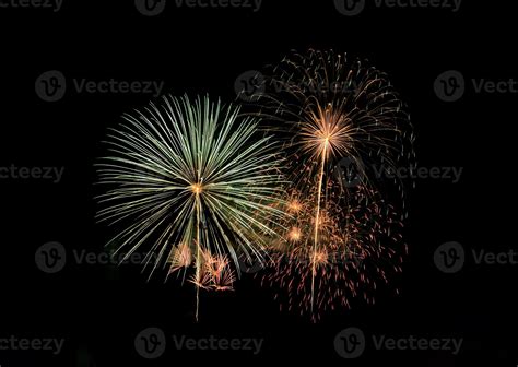 Abstract festive colorful fireworks explosion on black background ...