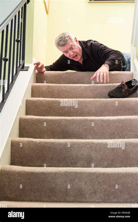 Senior Man Falling down Stairs Stock Photo - Alamy