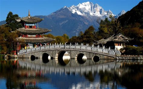 The bridge over the river in the mountains of China wallpapers and images - wallpapers, pictures ...