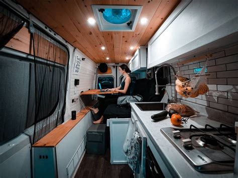 Just the right amount of space in this diy sprinter van conversion. I like that the layout has ...