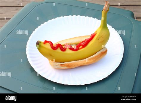 Banana dog with Ketchup Stock Photo - Alamy