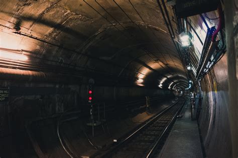 Black Train Rail Tunnel · Free Stock Photo