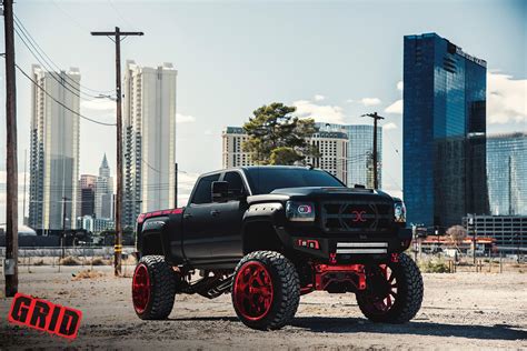 Amazing Black Lifted GMC Sierra with Red Accents and Off-Road Rims ...