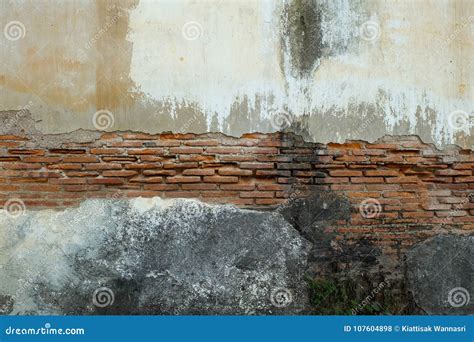 Damaged brick wall stock photo. Image of exterior, abstract - 107604898