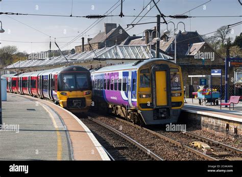 Northern Rail Siemens / CAF class 333 electric train (left) and BREL ...