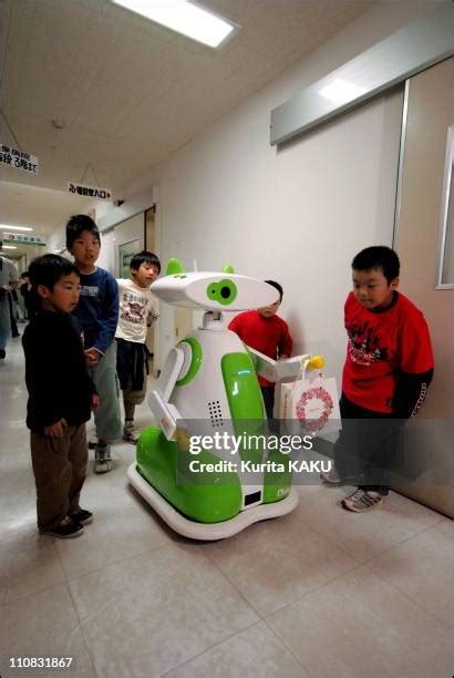 Japan Introduces First Hospital Robot Guide Photos and Premium High Res Pictures - Getty Images