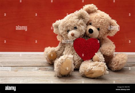 Love, friendship concept, tight hug. Two teddy bears embracing as a ...