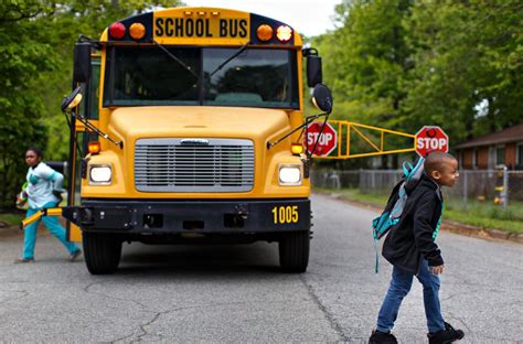 Guilford County testing new, longer school bus stop arms