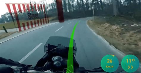 Extraordinary AI motorcycle HUD highlights hazards and cornering lines