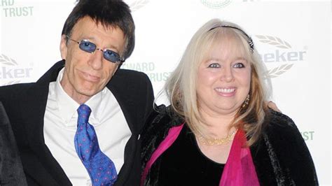 Robin Gibb and Claire Yang pictured together as a couple in 2004