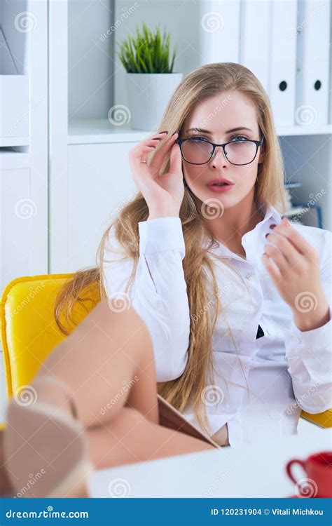 Office Flirt - Attractive Woman Flirting Over Desk with Her Coworker or Boss. Stock Photo ...