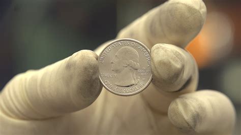 Coin Flip: U.S. Mint Issuing Quarters With New `W' Mark - Bloomberg