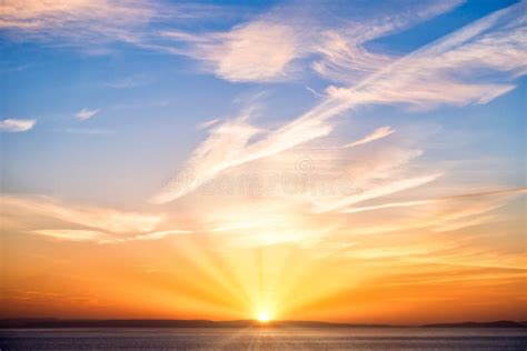 Sunrise with Sun, Sun Rays, Blue Sky, Clouds and Sea Stock Photo - Image of orange, scenery ...