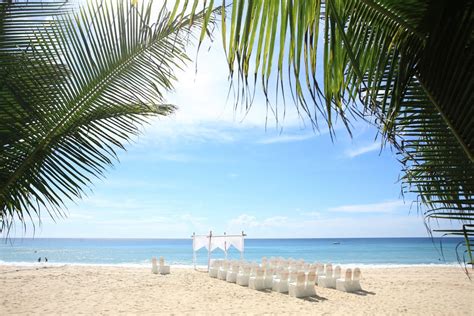 private beach wedding main - Enchanted Honeymoons