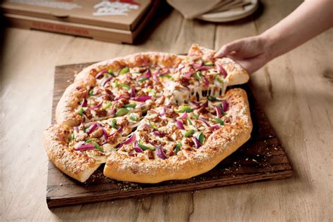 Redefining a Category Standard: Pizza Hut® Launches All New Hand-Tossed Pizza Featuring a ...