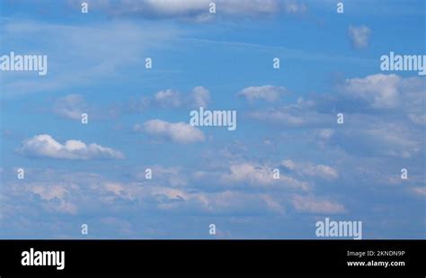 Growing and swelling dramatic slow Cumulus and Altostratus cloud ...