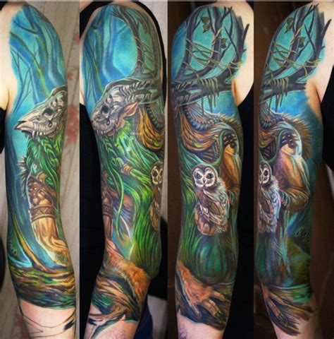 New school style colored mystical forest man with owl tattoo on half sleeve - Tattooimages.biz