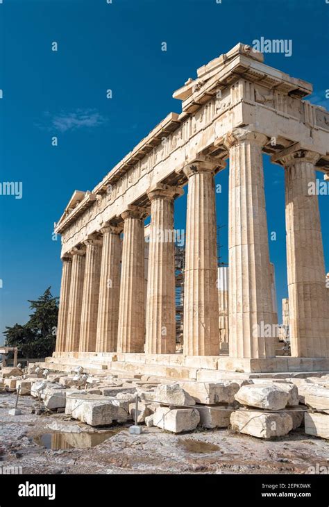 Parthenon temple on Acropolis, Athens, Greece. It is top landmark of Athens. Ruins of famous ...