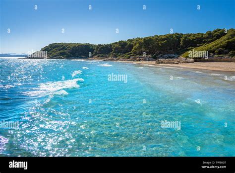 Cala de roca Plana beach in Tarragona beside Waikiki beach also Cala Fonda Stock Photo - Alamy