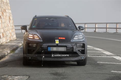 2023 Porsche Macan EV Spotted Testing In The Alps Alongside Cayenne | Carscoops