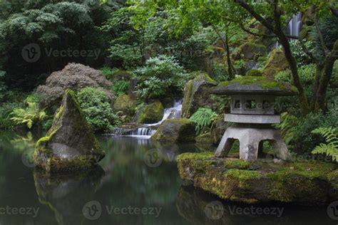 Pond and waterfall in Japanese garden 747630 Stock Photo at Vecteezy