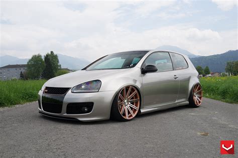 Stanced Out VW Golf GTI Sporting Multi Spoke Aftermarket Wheels Wrapped in Tires — CARiD.com Gallery