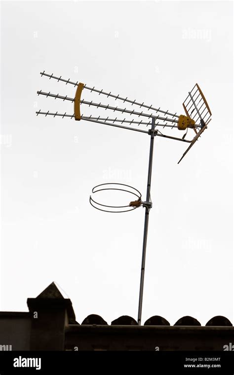 An analog television antenna is seen on a house roof in Arna, Majorca ...