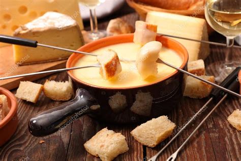 Cheese fondue with bread — Stock Photo © studioM #129847746