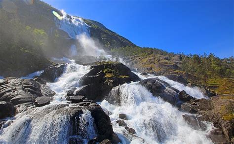 Fjord in West Coast Norway and waterfalls.