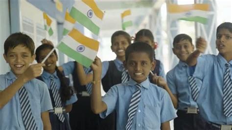 Happy kids in uniform waving indian flag... | Stock Video | Pond5